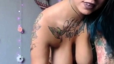 busty tattooed latin cam-slut