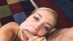 German blonde slut in black stockings buries a long shaft in her ass