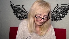 Blonde amateur MILF with glasses chatting on webcam show